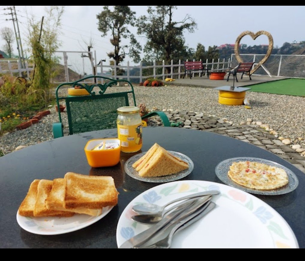 Breakfast on the terrace at Annfield Cottage